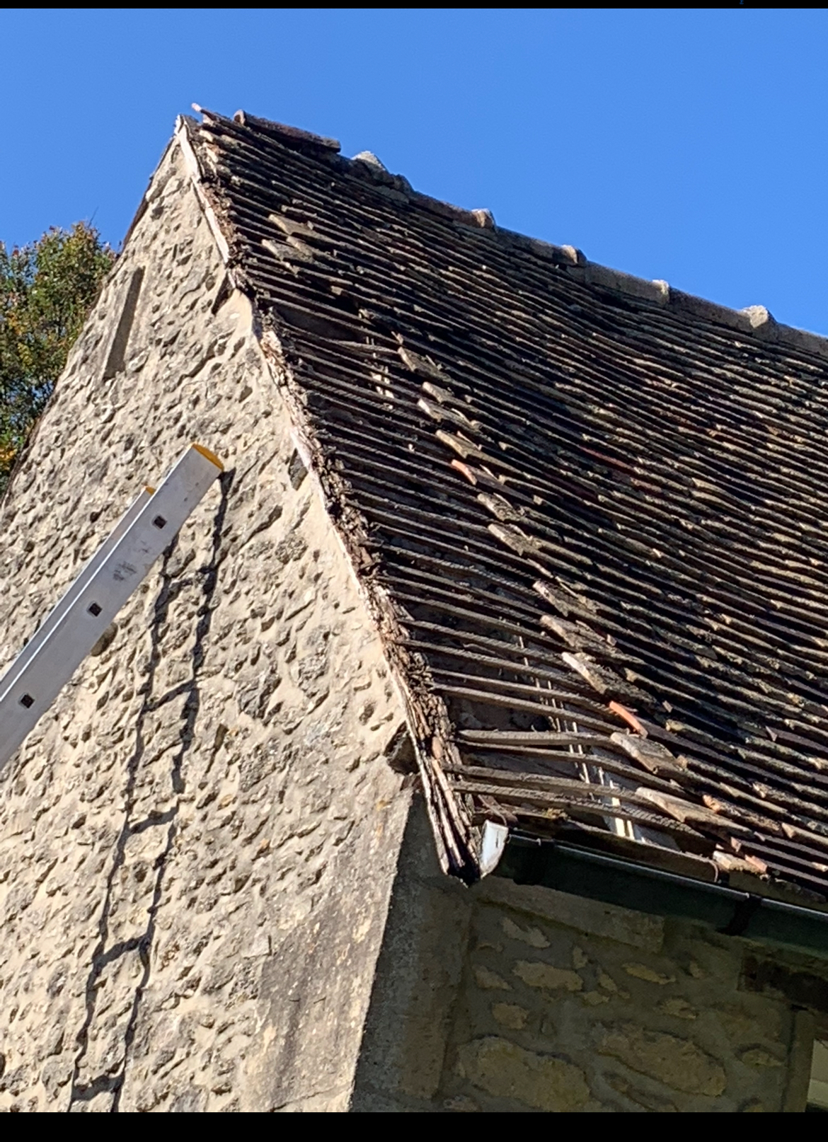 Rénovation d'une toiture ancienne en tuiles plates